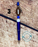 Football themed beaded pen with helmet charm